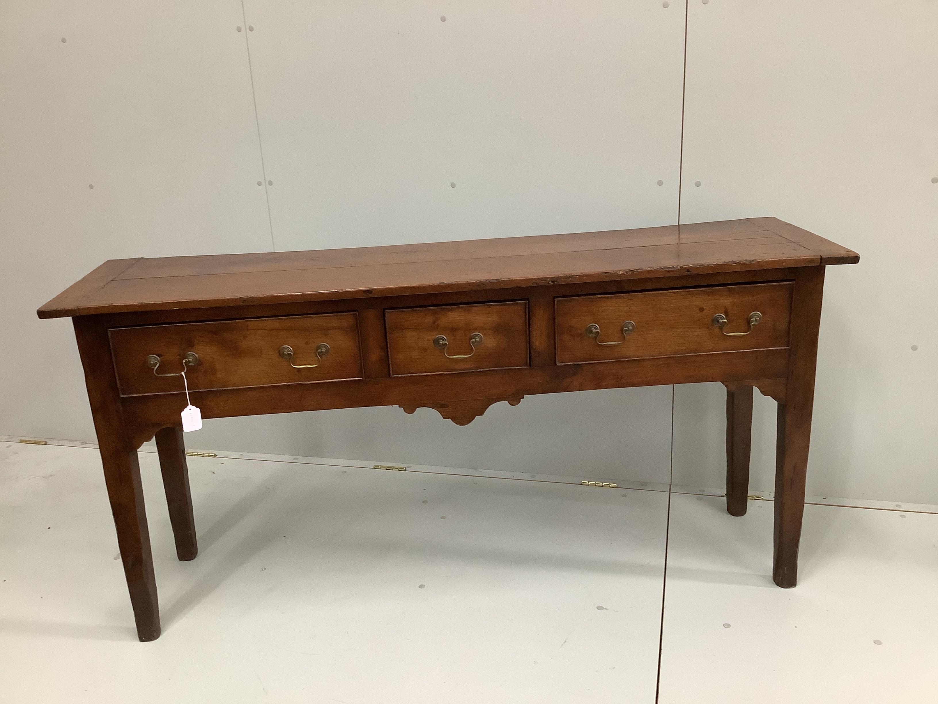 An 18th century style oak and fruitwood low dresser, width 166cm, depth 43cm, height 82cm